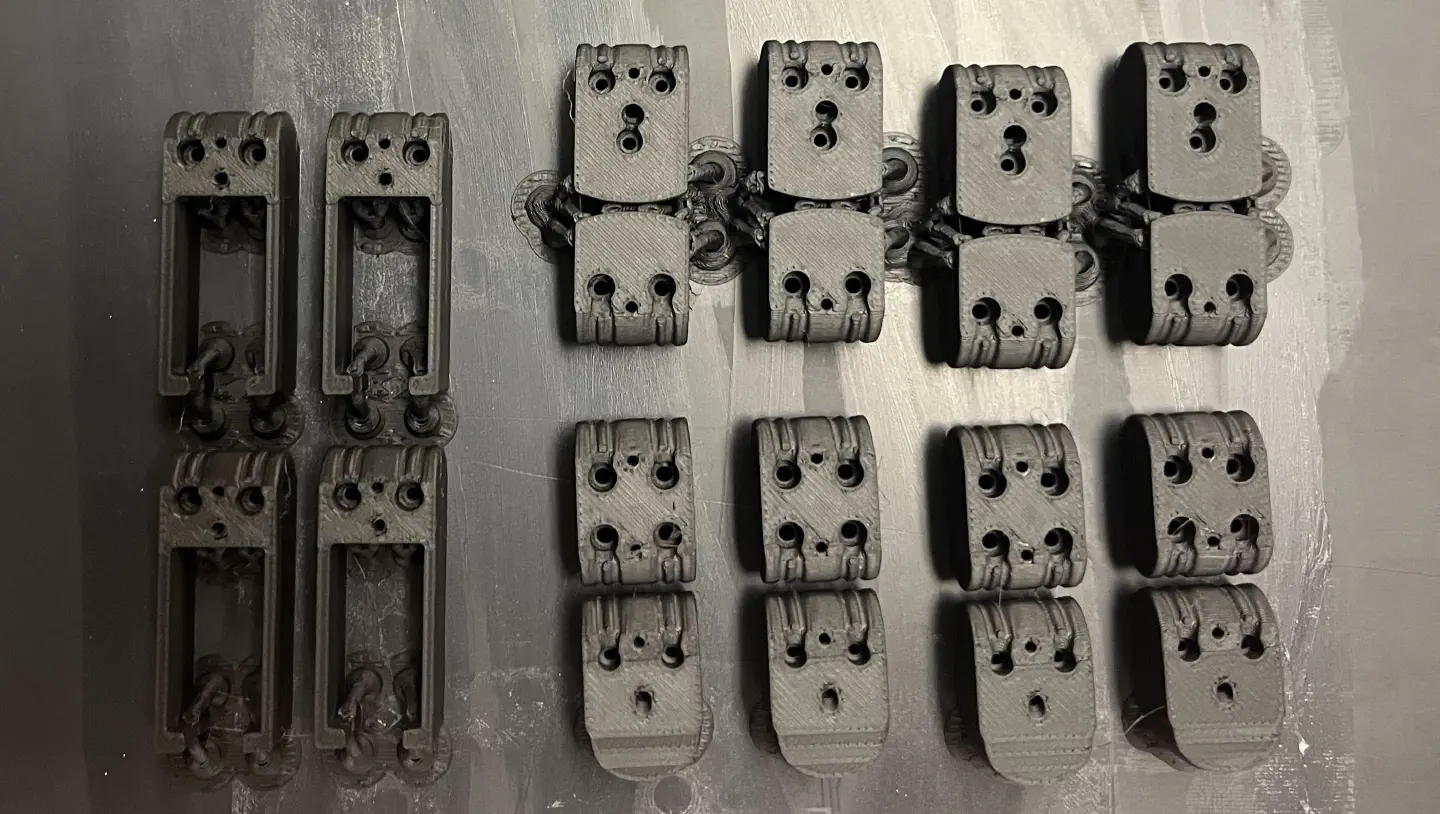 Printed DexAloha parts laid out on the table